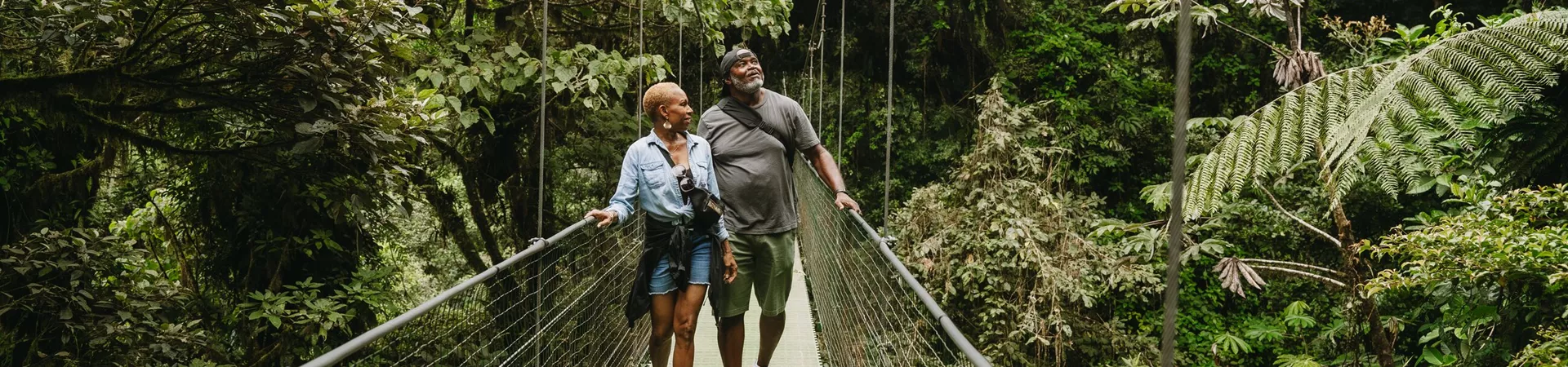 Trafalgar Guests Cheryl And Al Walking The Sky Walk in Costa Rica