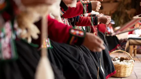 Women In Traditional Outfits Sewing