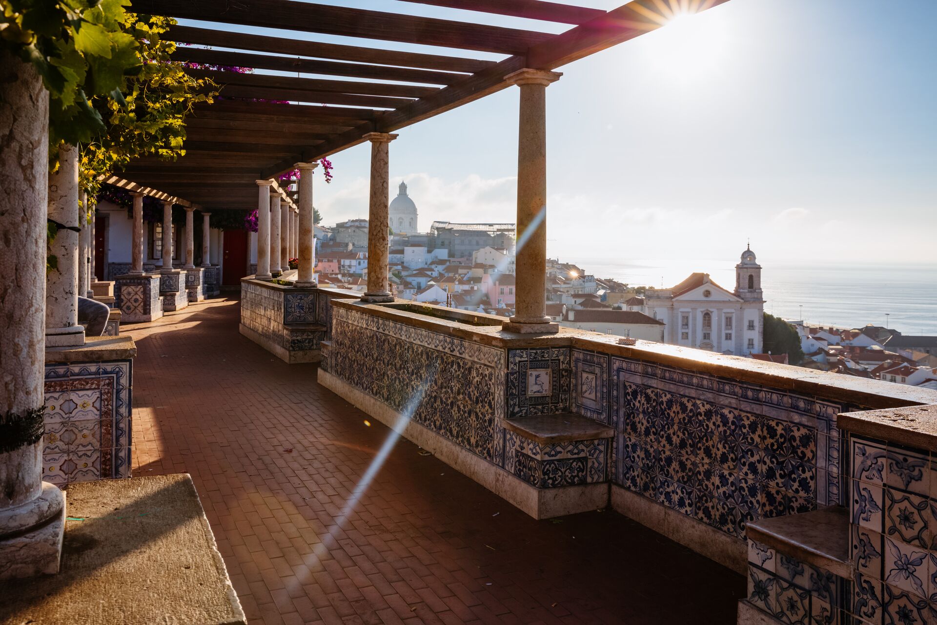 Miradouro De Santa Luzia viewpoint over Lisbon, Portugal at dusk