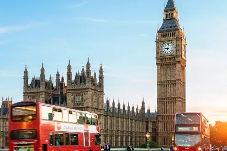 Big Ben and traffic near Westminster Bridge in London