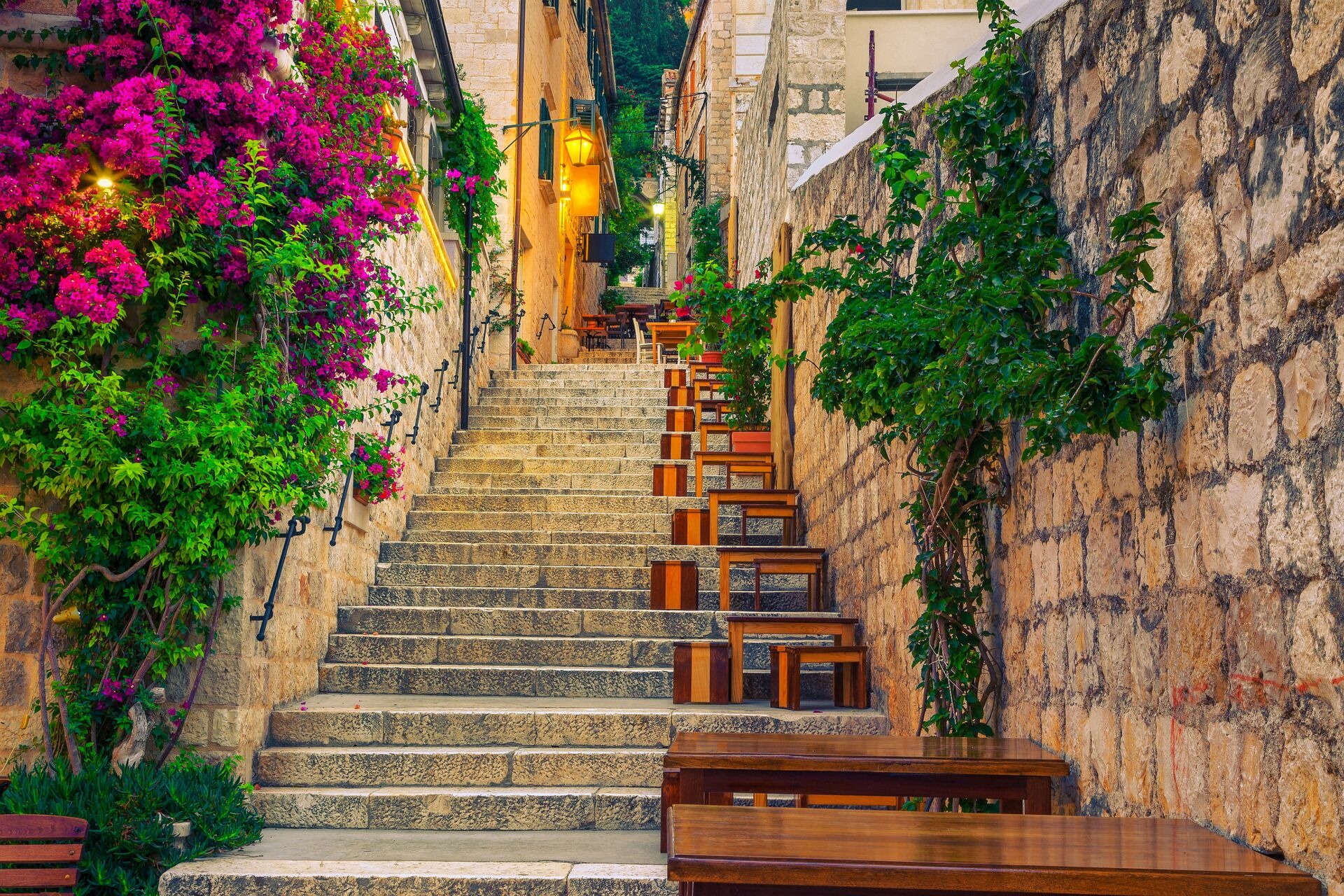 Narrow Street And Street Cafe Decorated With Flowers Hvar Croatia