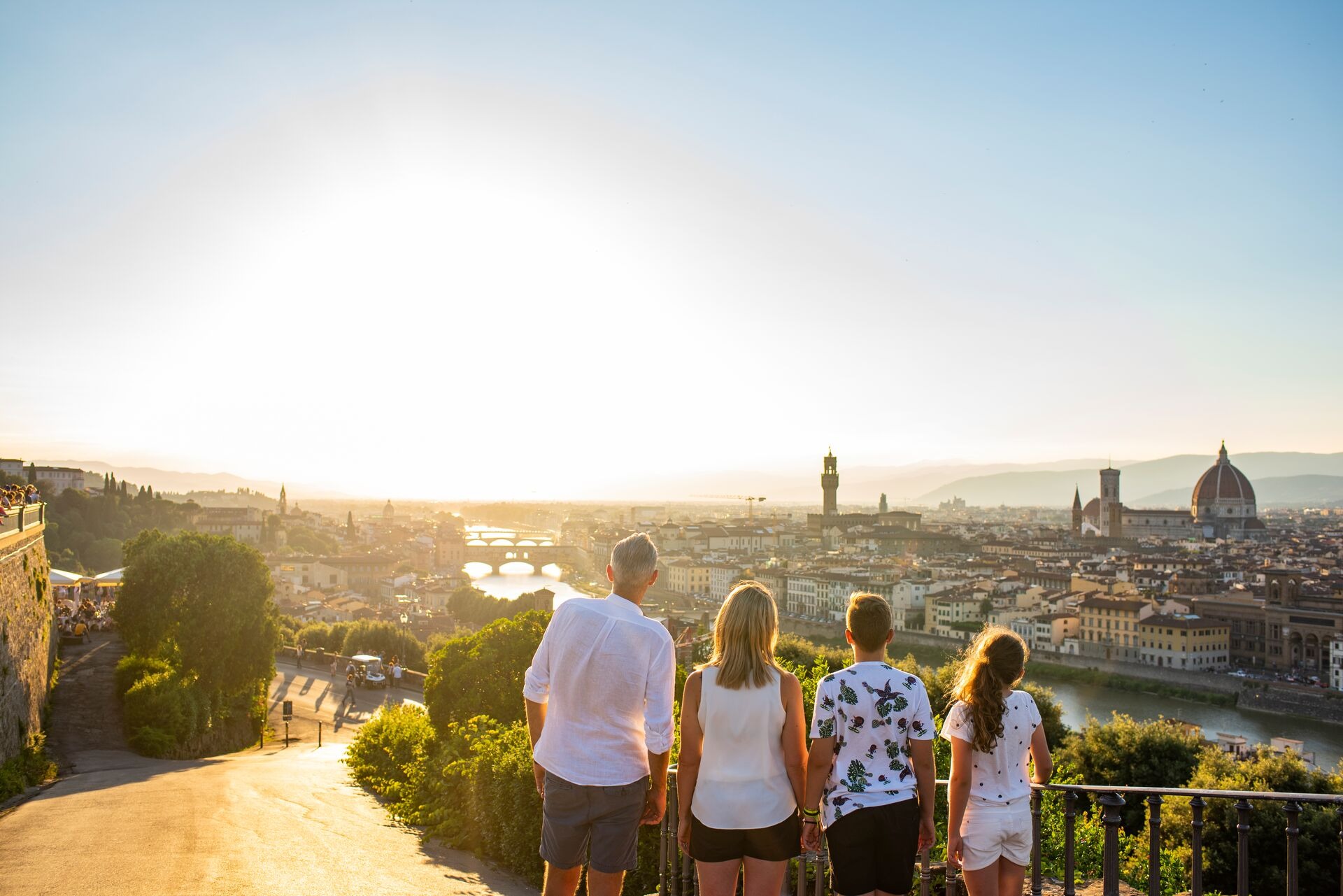 A family looking out at the skyline of Florence, Italy