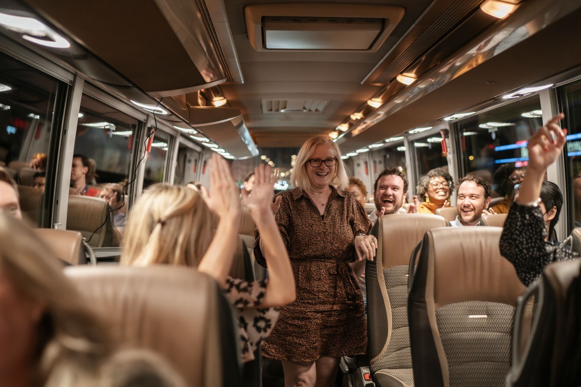 People laughing in the coach