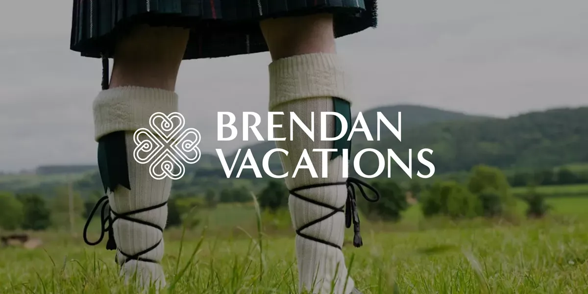 Person In Kilt And Socks With Brendan Vacations Logo
