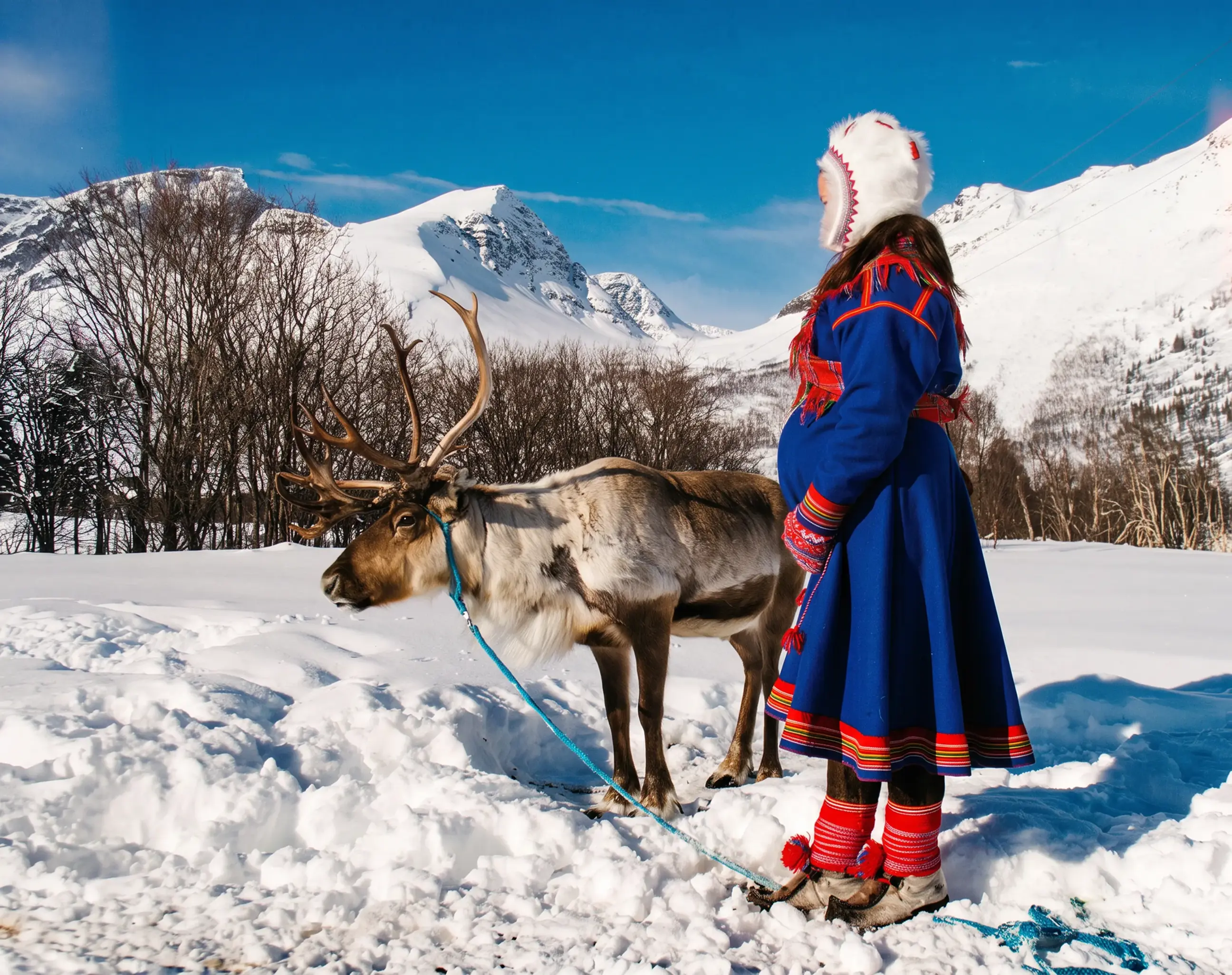 sami-girl-raindear-tromso-norway.webp