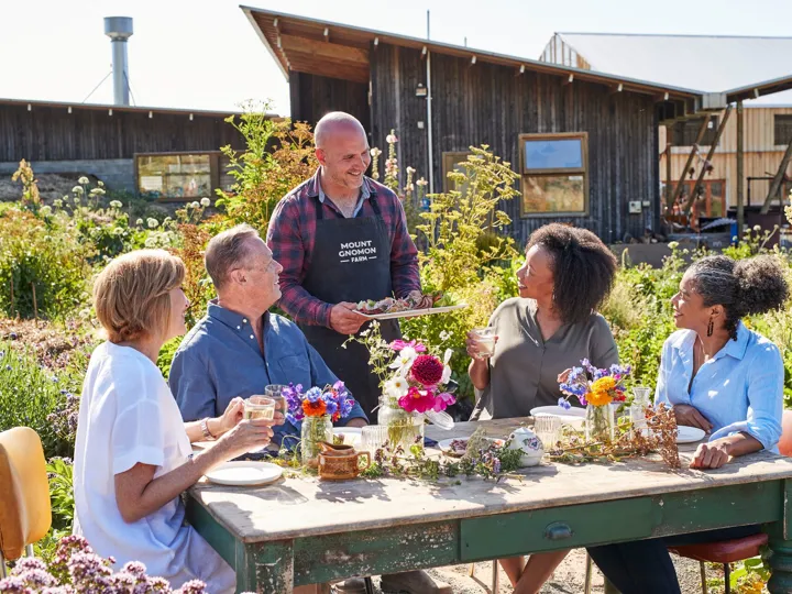 People Eating Lunch At Mount Gnomon Farm With Guy Robertson in Australia Tasmania