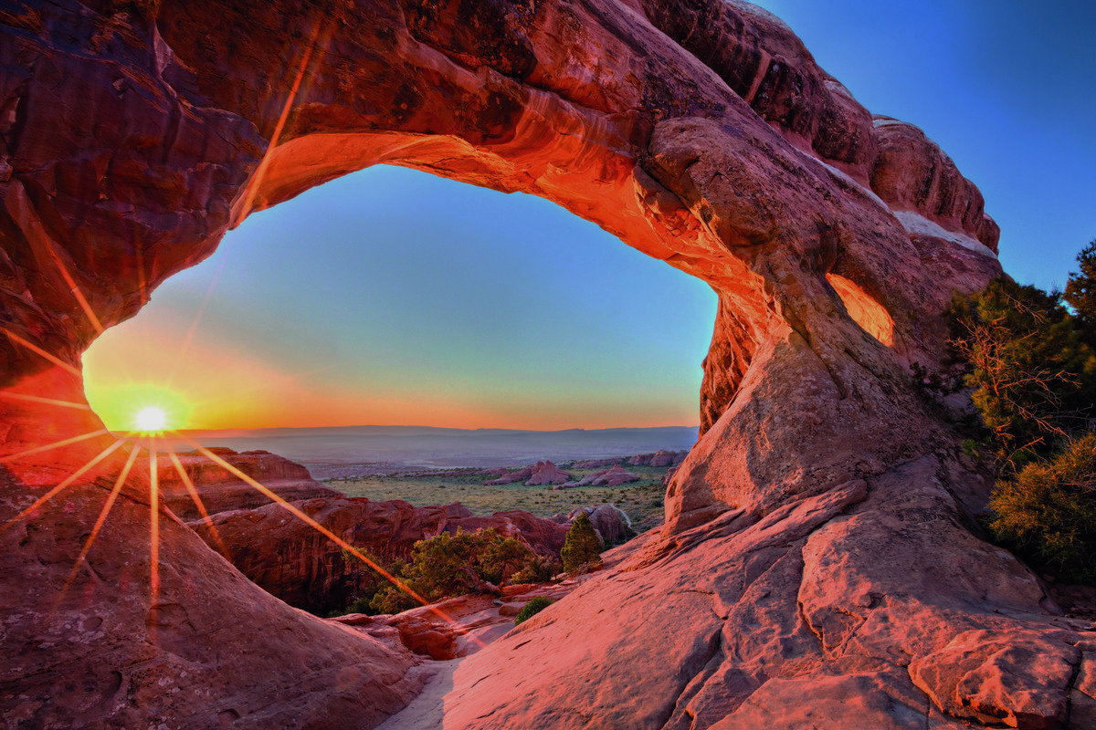 Sunset over the canyon in Arches National Park