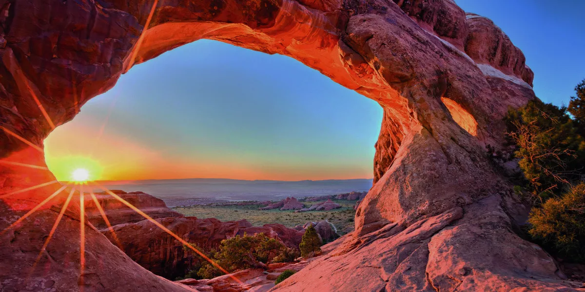 Sunset over the canyon in Arches National Park