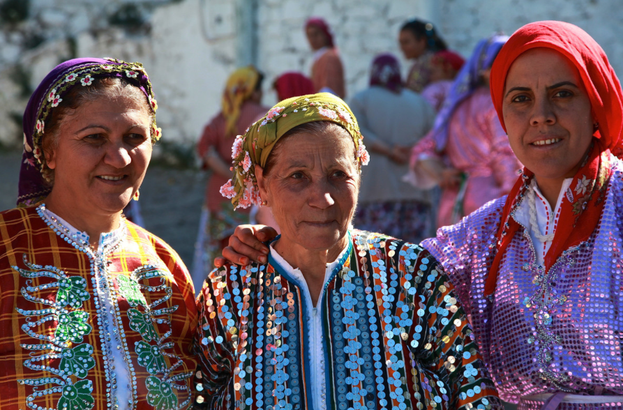 Three Turkish women in traditional clothing, Demircidere, Turkey