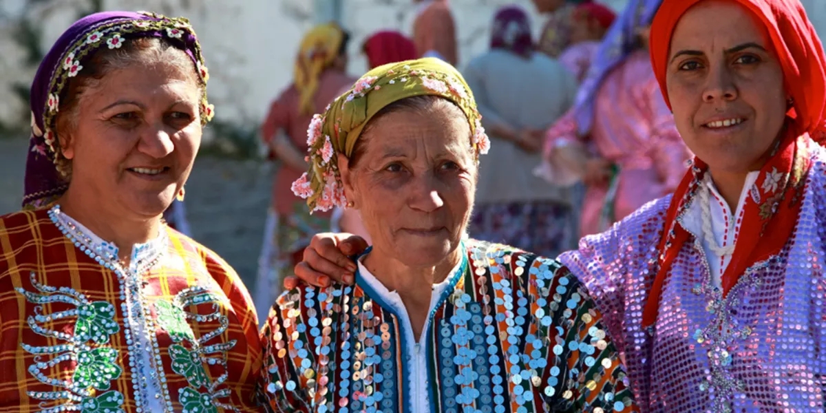 Three Turkish women in traditional clothing, Demircidere, Turkey