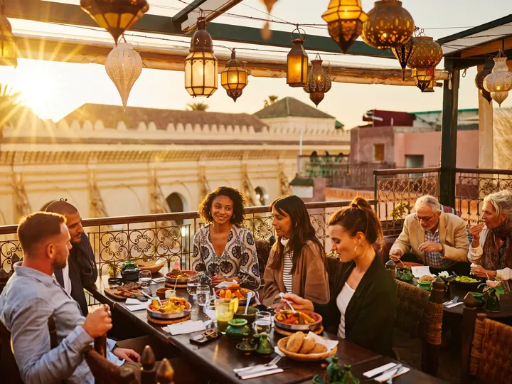 People having dinner at the rooftop