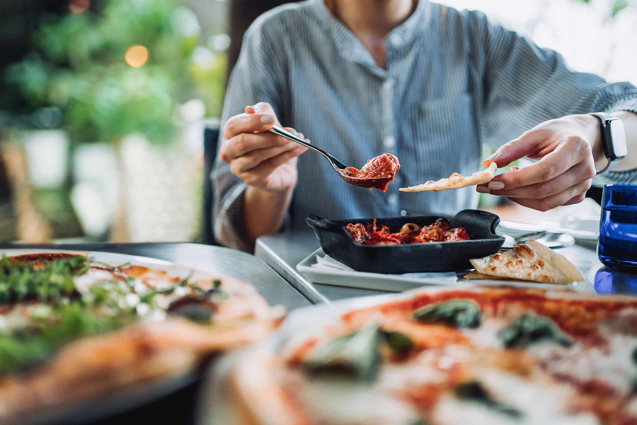 A person enjoying an Italian dinner in Rome