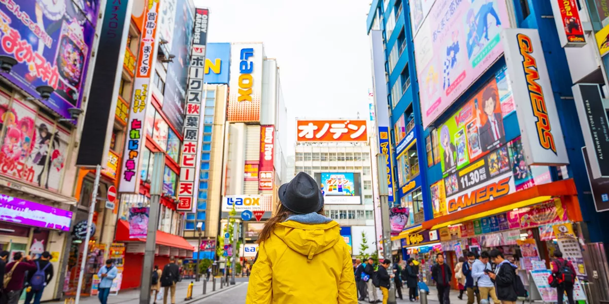 Tourist Walking In Akihabara Electronic Town, Tokyo, Japan