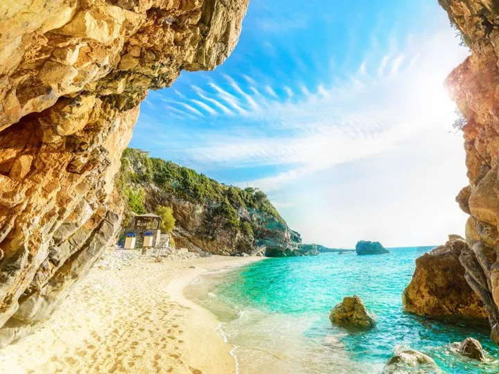 Bay with beach and rocky cliffs on Corfu, Greece