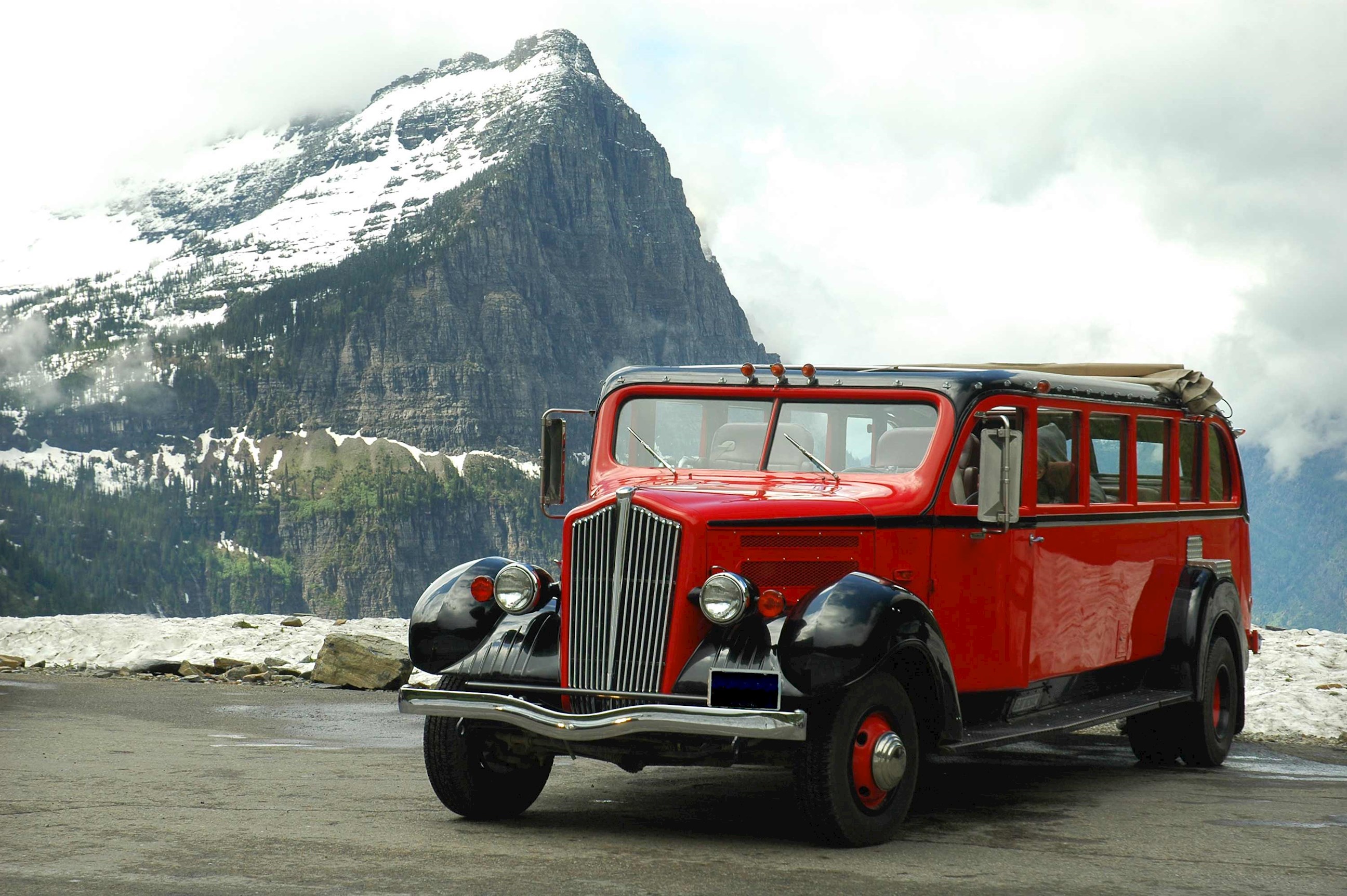 red-jammers-bus-waterton-lakes-national-park-canada.jpg