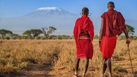 Warriors From Maasai Tribe Looking At Mount Kilimanjaro Kenya Africa