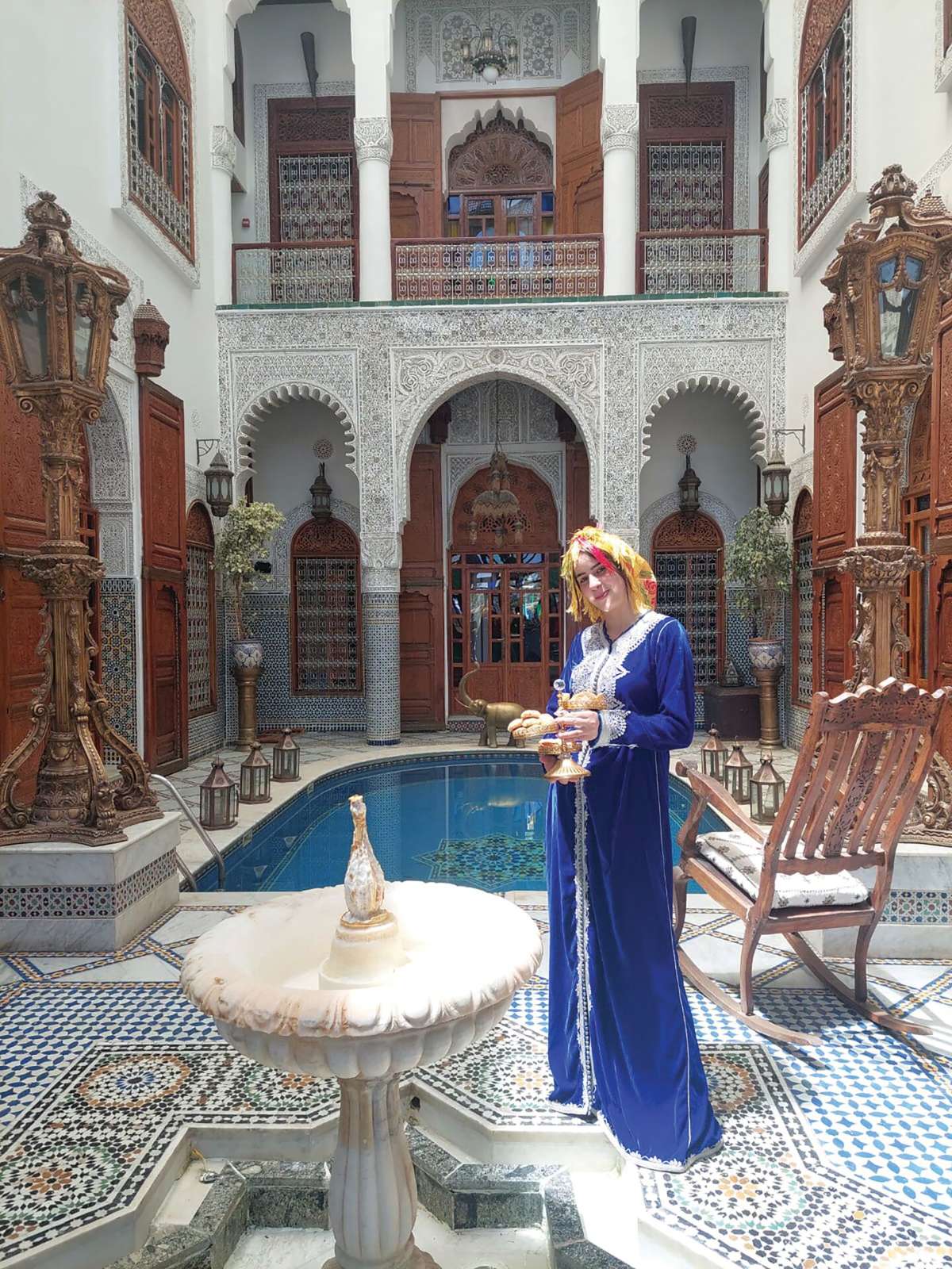 Amina Standing On Piazza Of Riad Arabesque House in Morocco