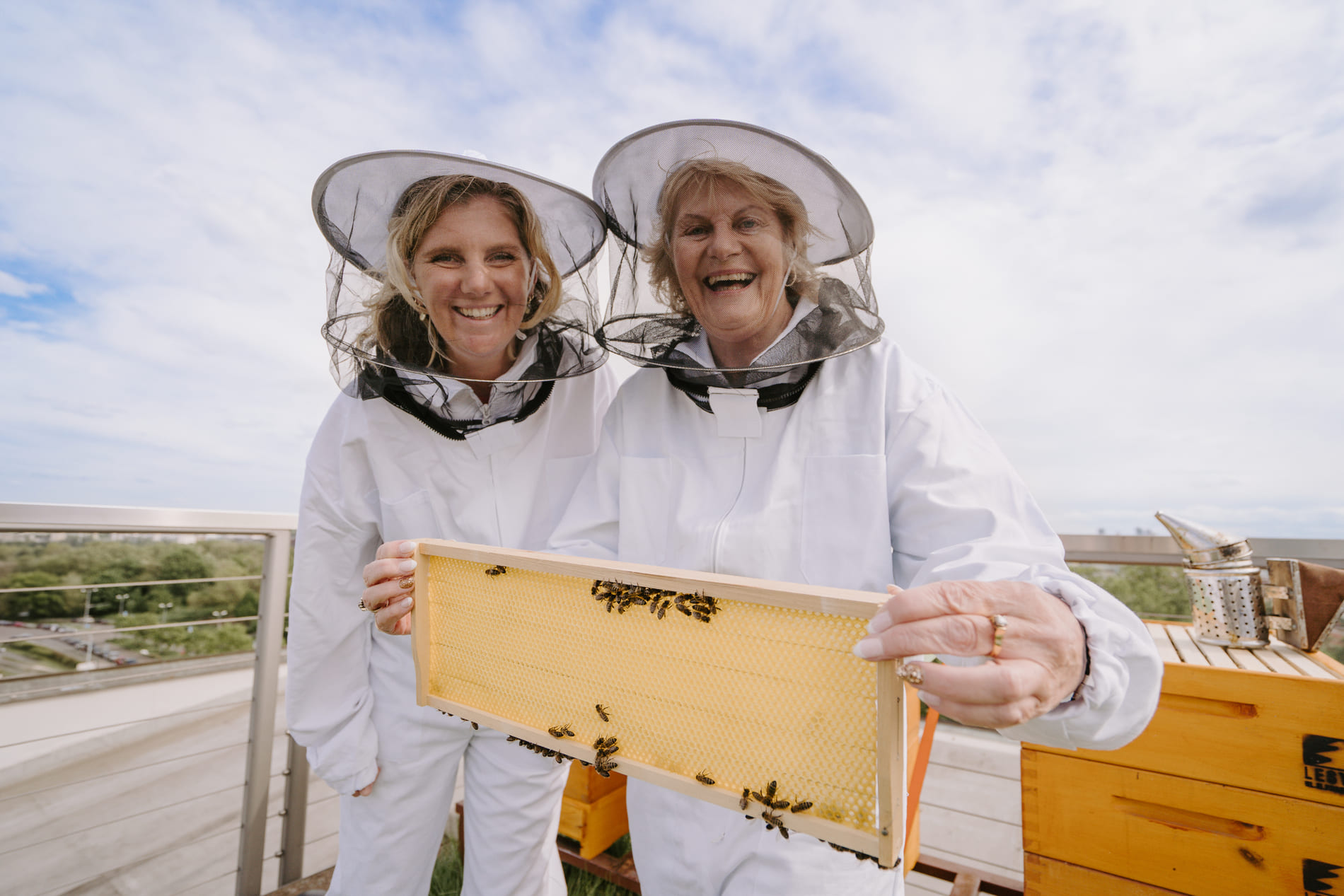 Briony and Heather beekeeping in Prague, Czech Republic