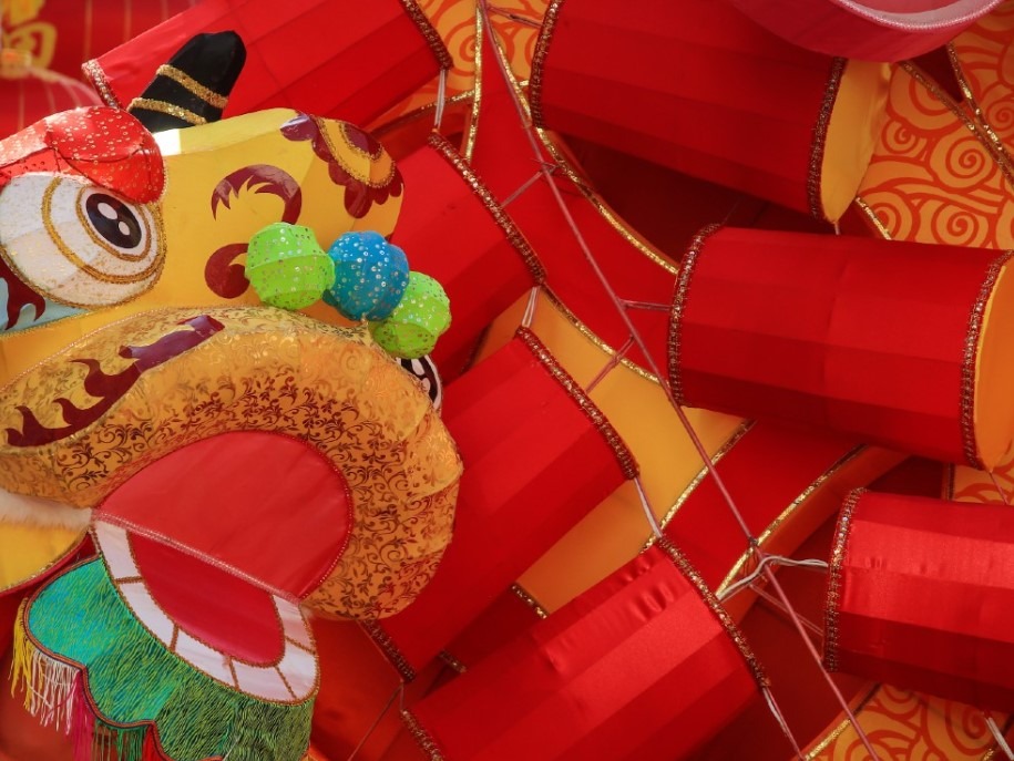 a-close-up-of-a-dragon-decoration-on-a-wall.jpg