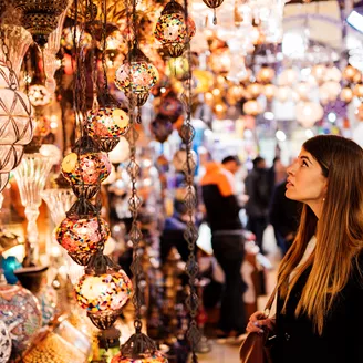 Young Woman Looking At Lights On Market Stall, Istanbul, Turkey 561094161