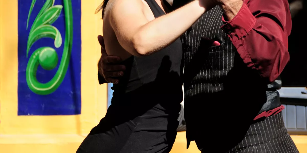 Couple Dancing Tango In Caminito, La Boca, Buenos Aires, Argentina