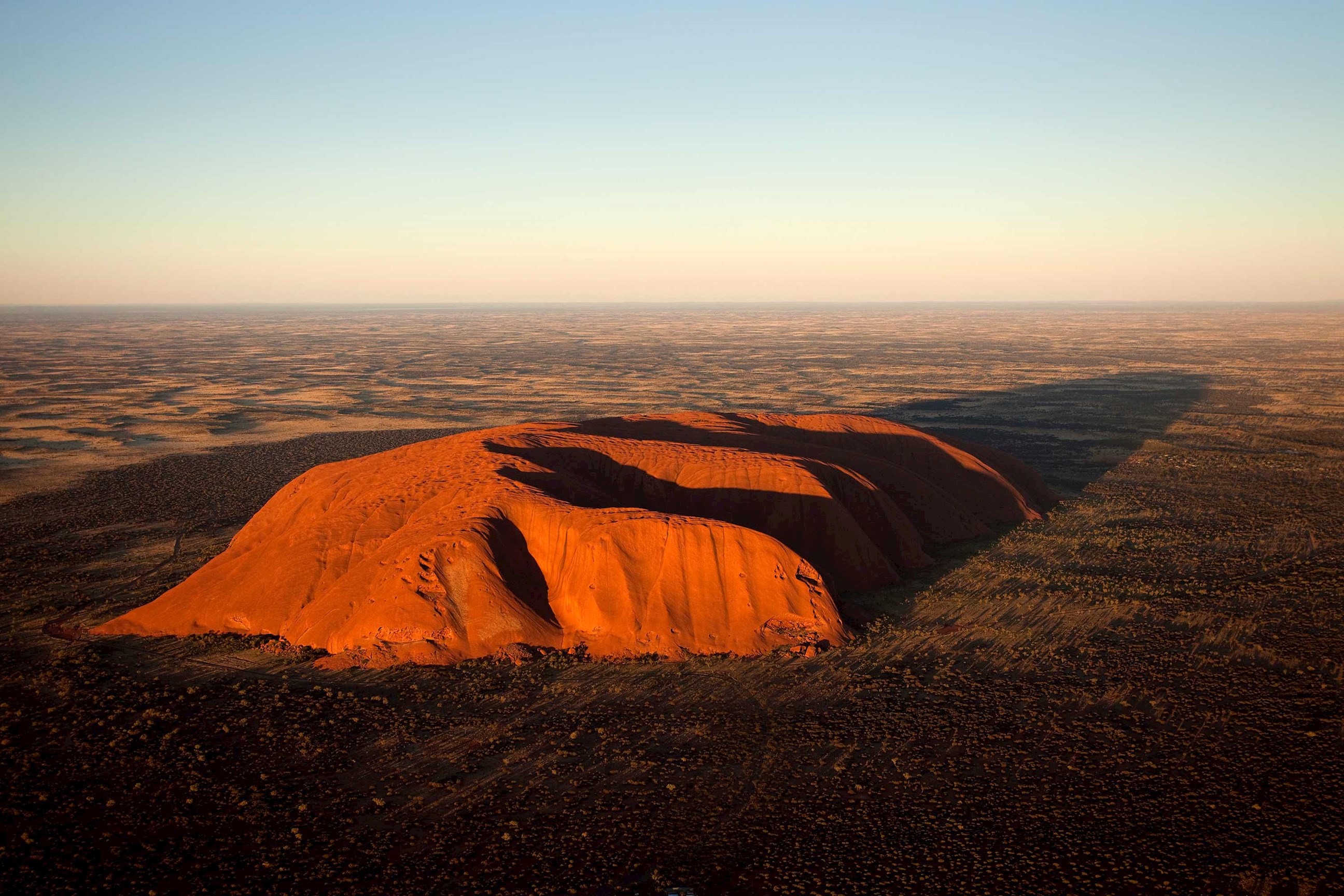 Enjoy a scenic flight over Ayers Rock in Uluru, Australia