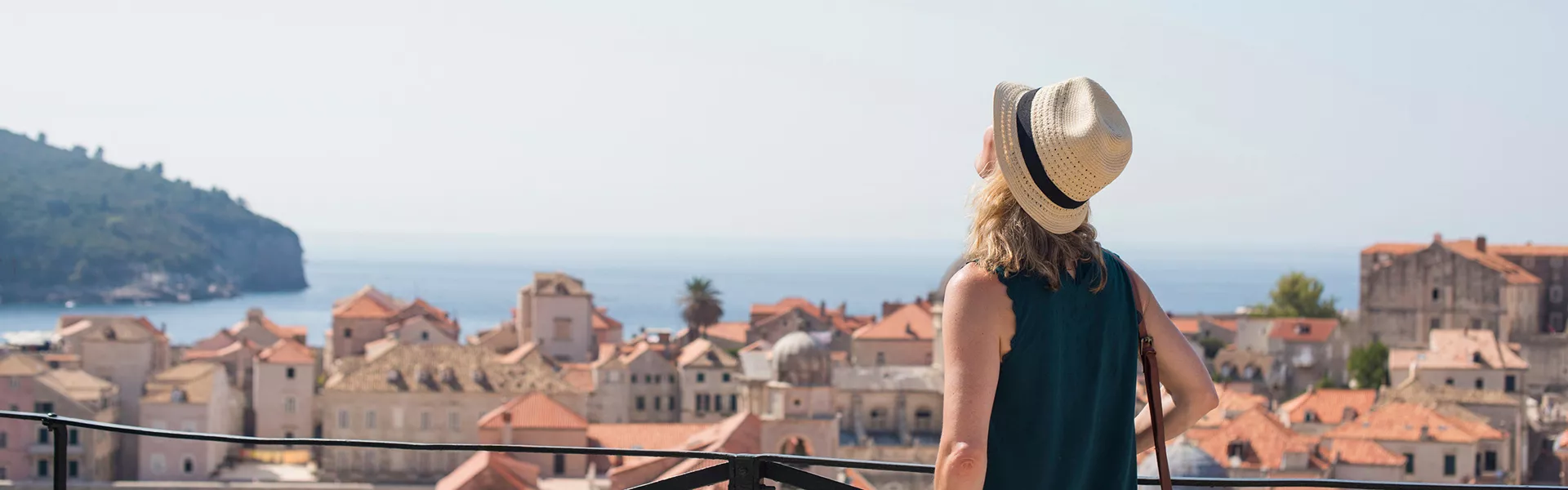 A woman admiring seaview in Dubrovnik, Croatia