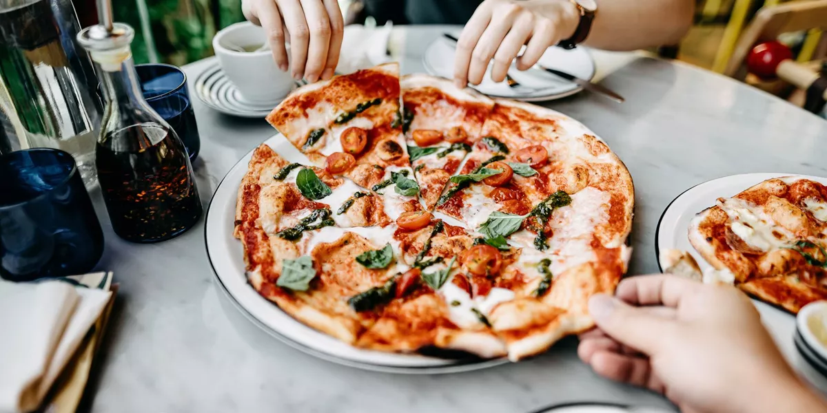Couple sharing a pizza