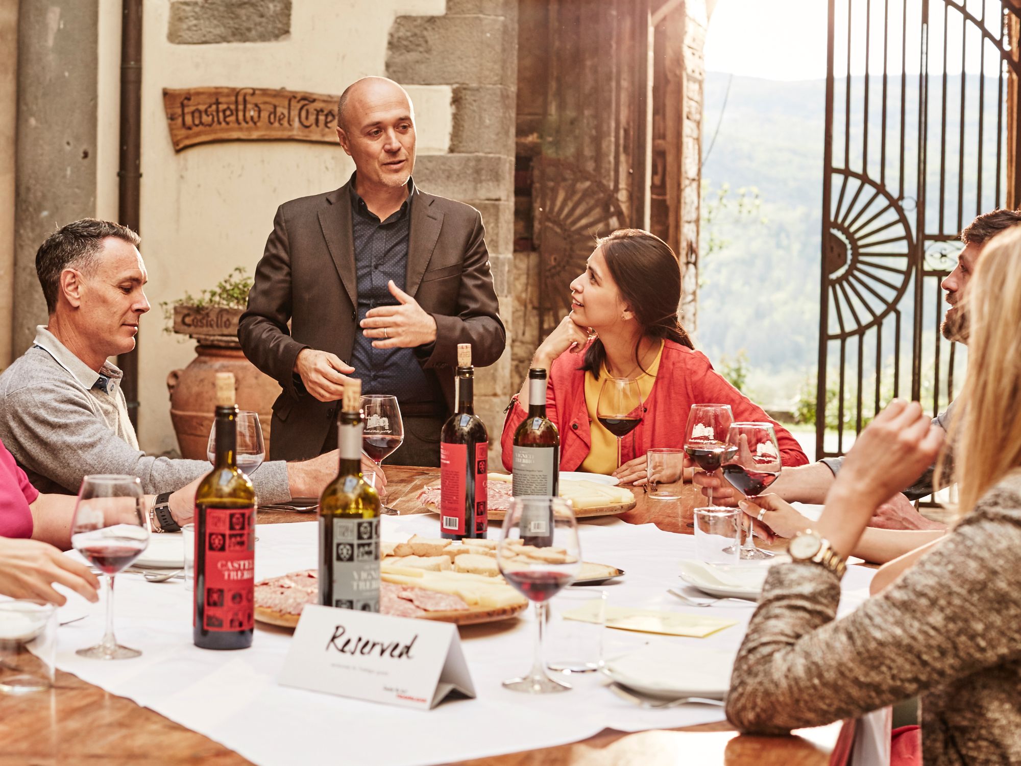 Wine tasting by the table in Castello Del Trebbio, Italy