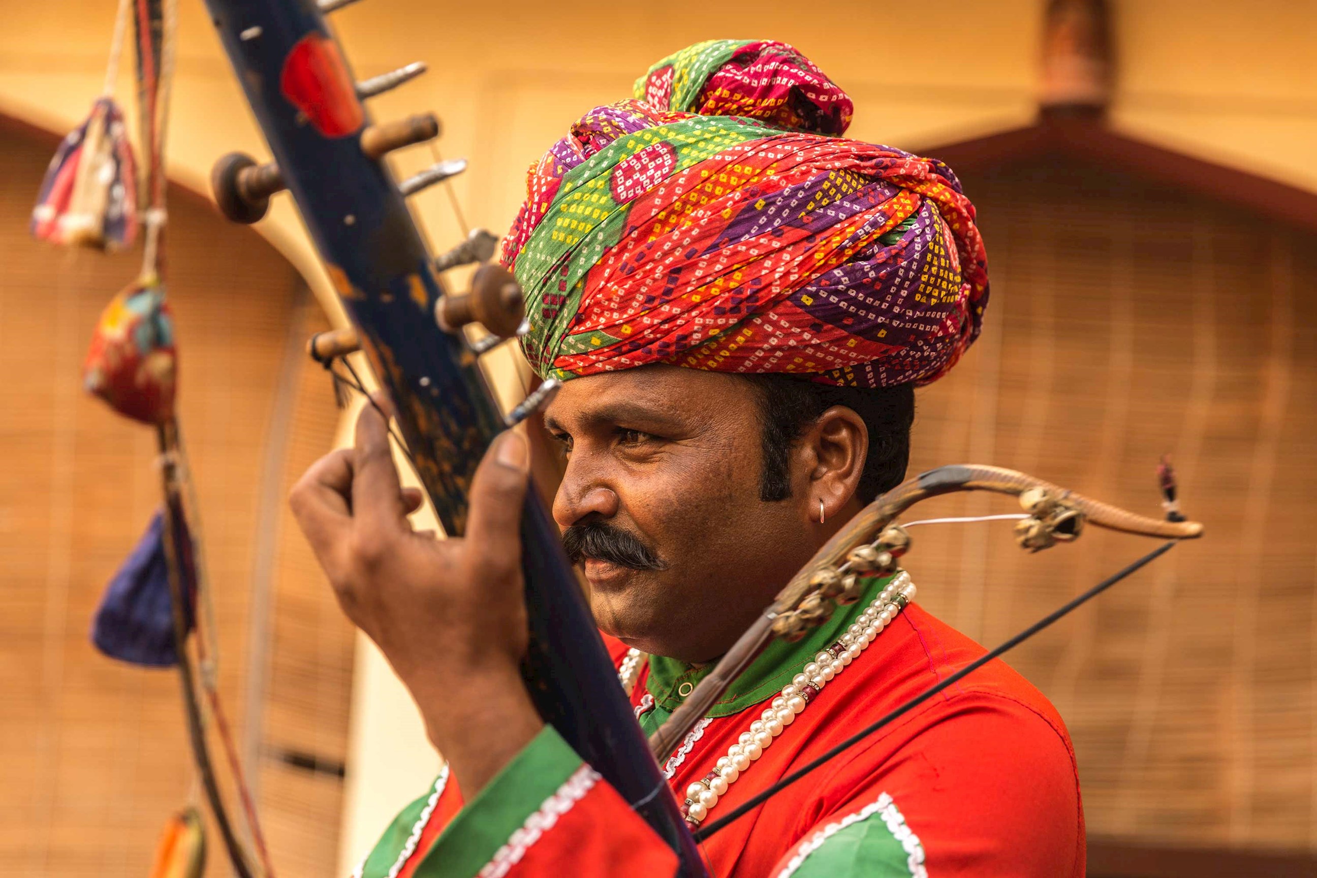 man-playing-musical-instrument-jaipur-india.jpg