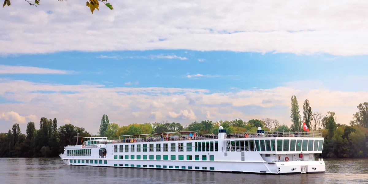 A river cruise ship moored on a European river.