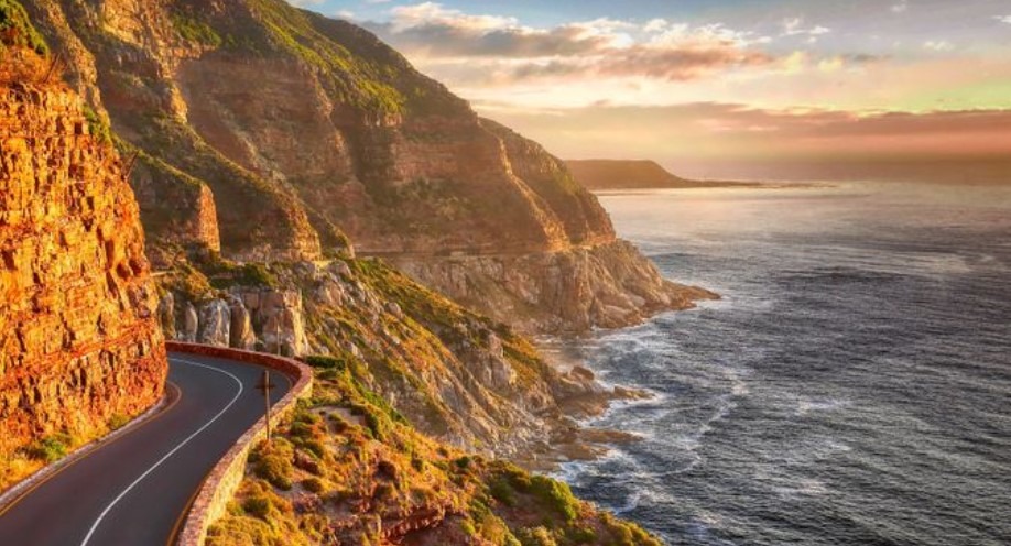 A scenic view of a road near the ocean