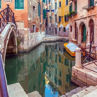 Canal and Footbridge in Venice, Italy