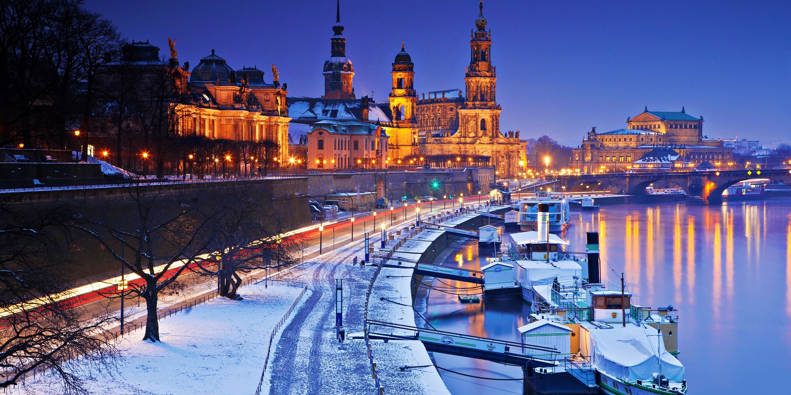 River and old city buildings in winter in Dresden, Germany