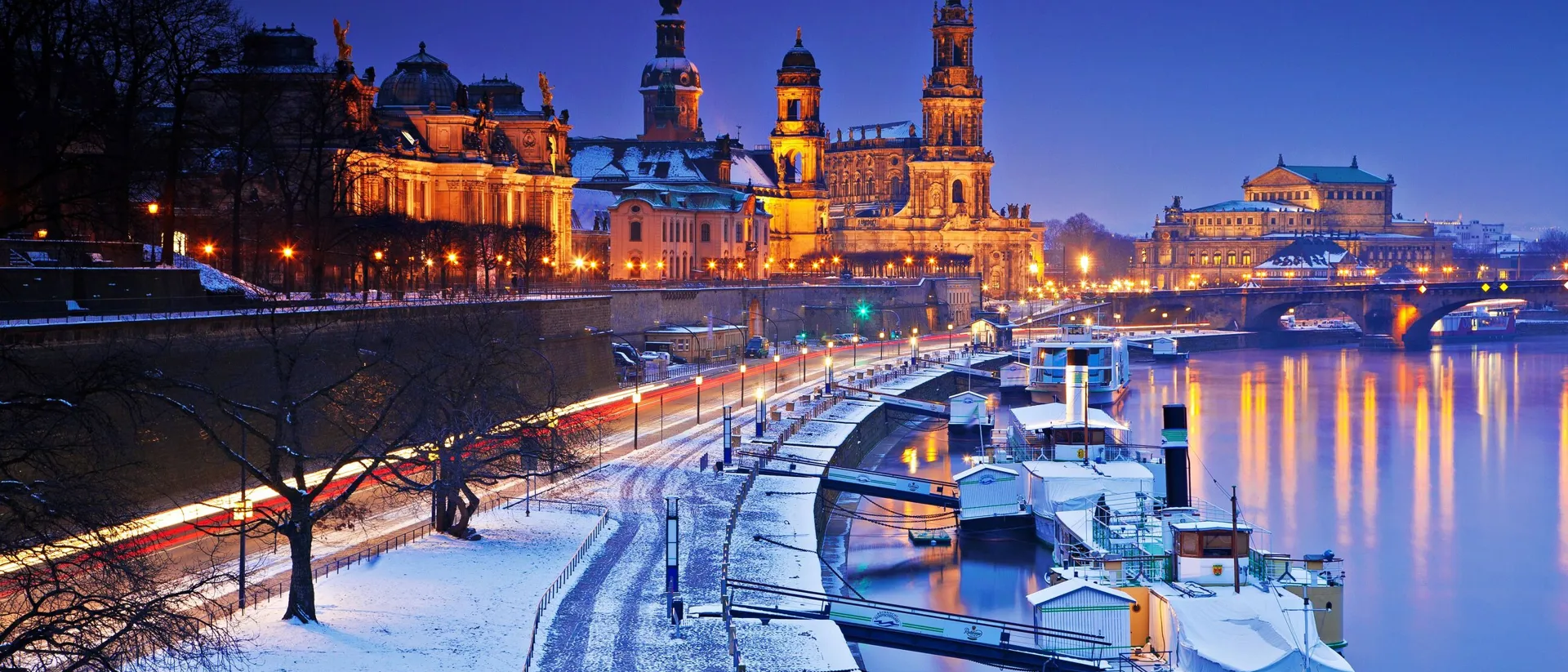 River and old city buildings in winter in Dresden, Germany