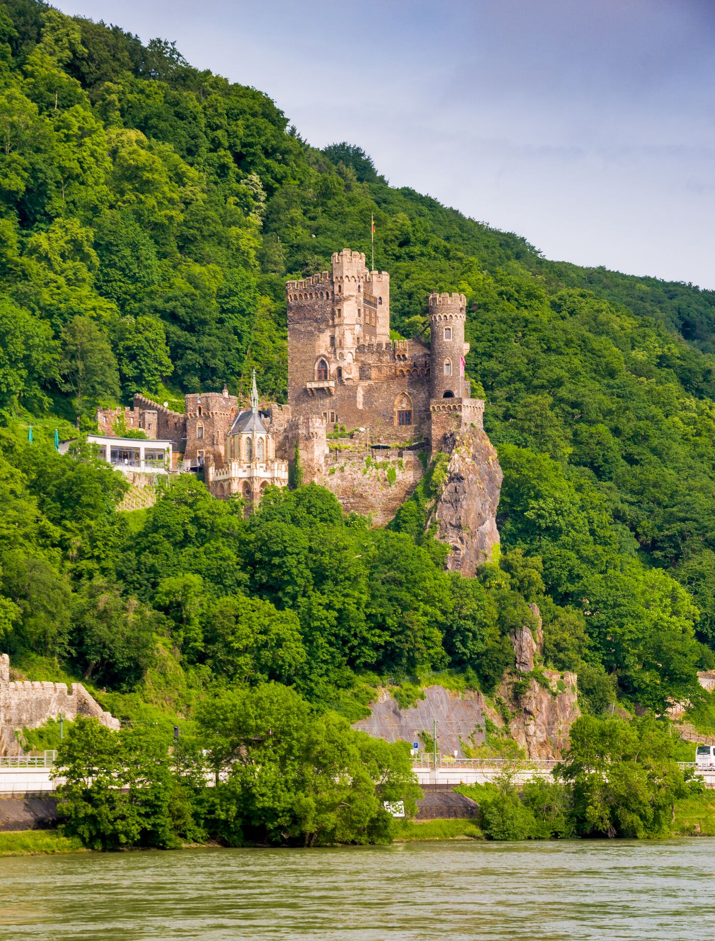 Rheinstein Castle in Germany amongst the hills and trees