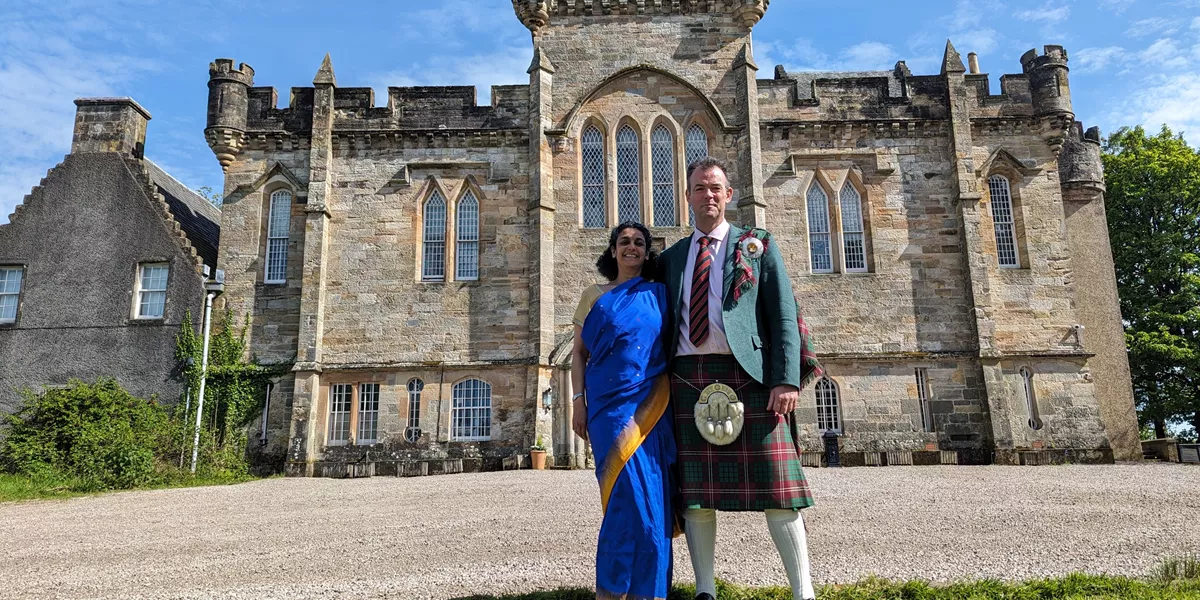 The Laird of Craufurdland and his wife, Adity, standing in front of Craufurdland Castle