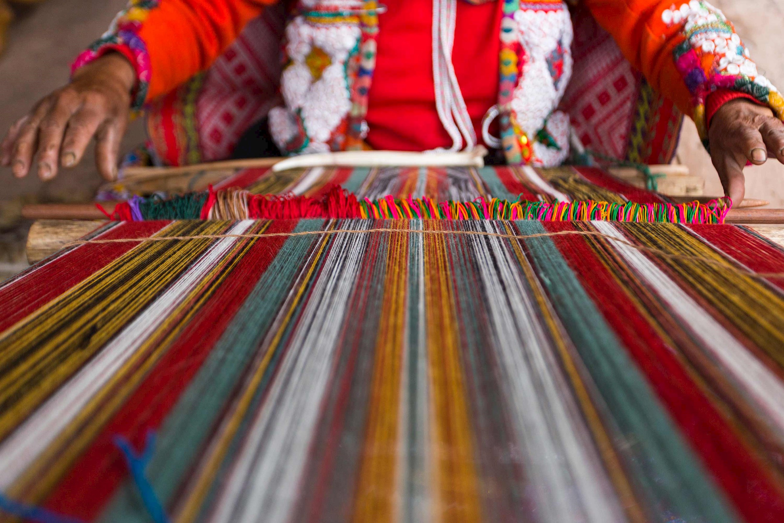 woman-weaving-sacred-valley-peru.jpg