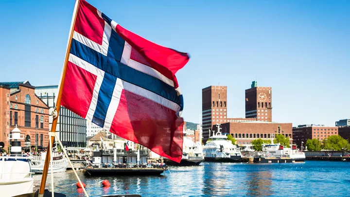 Flag infront of City Hall and Marina in Oslo, Norway