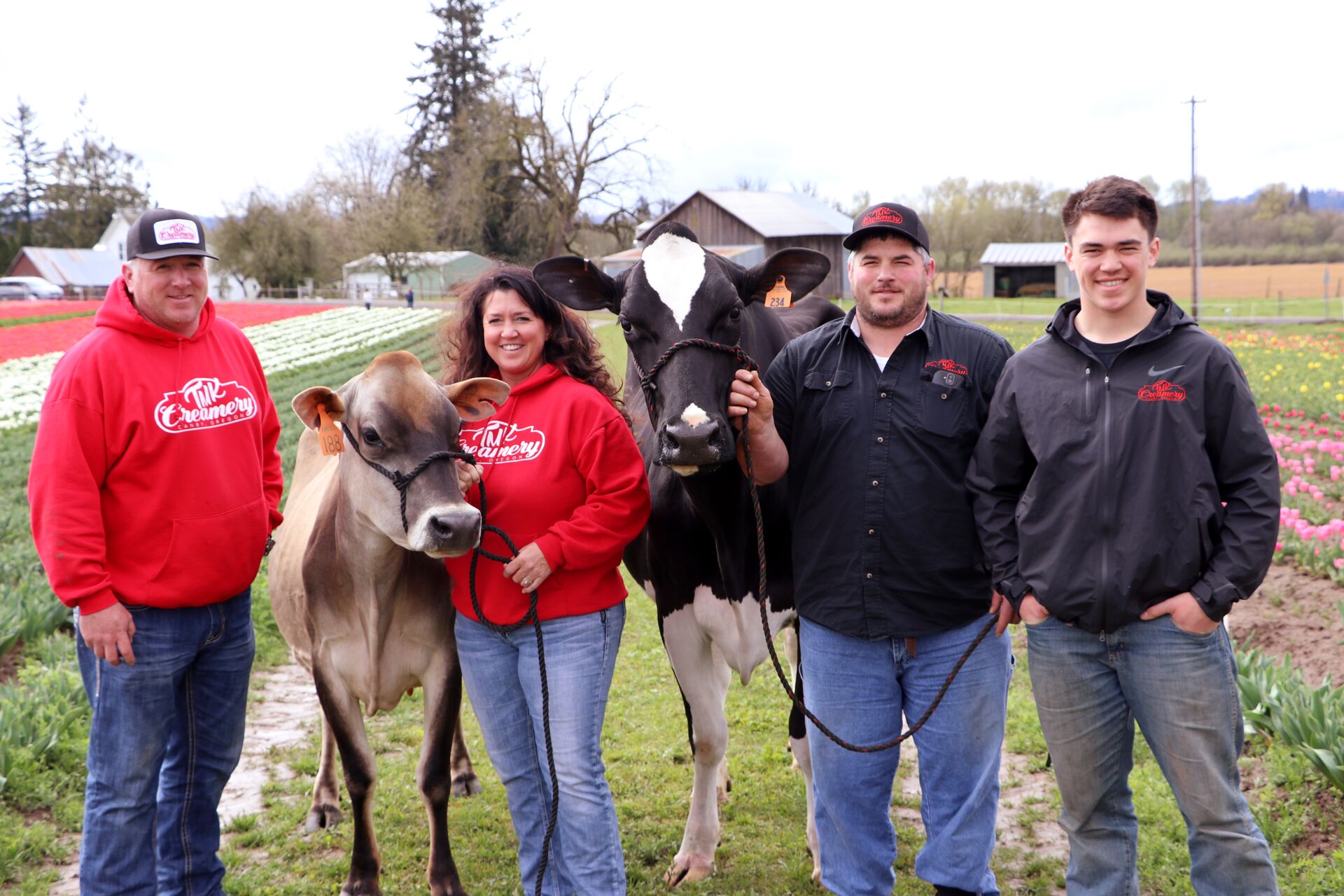 Koch Family on their farm with cows in Oregon