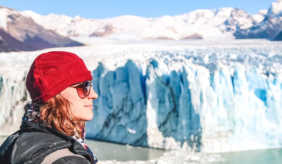 Woman looking at a glacier in the UNESCO-listed Los Glaciares National Park in Patagonia