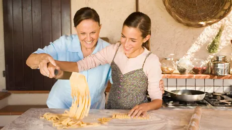 Mother Daughter Making Pasta