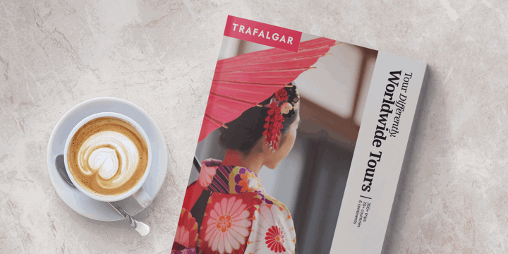 Coffee and Trafalgar brochure on the table