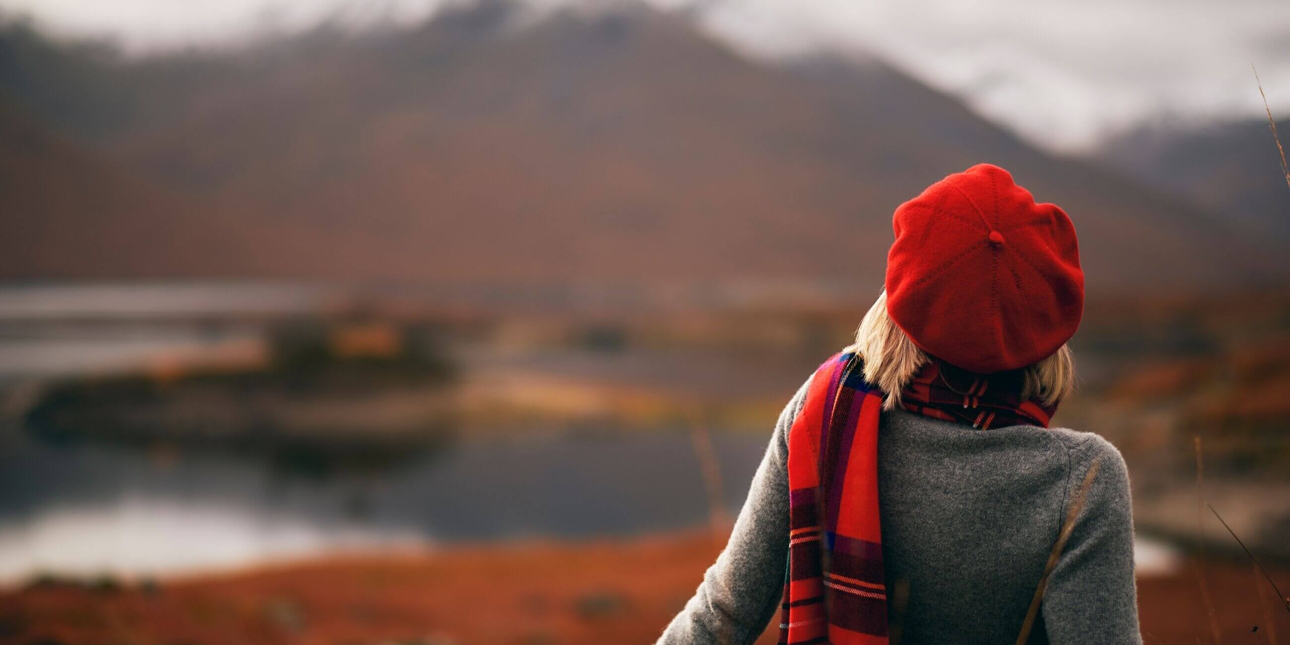 Woman watching the sights in the Scottish Highlands