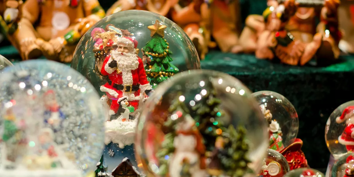 Close up of a Christmas Snow Globe Toy in a Christmas Market