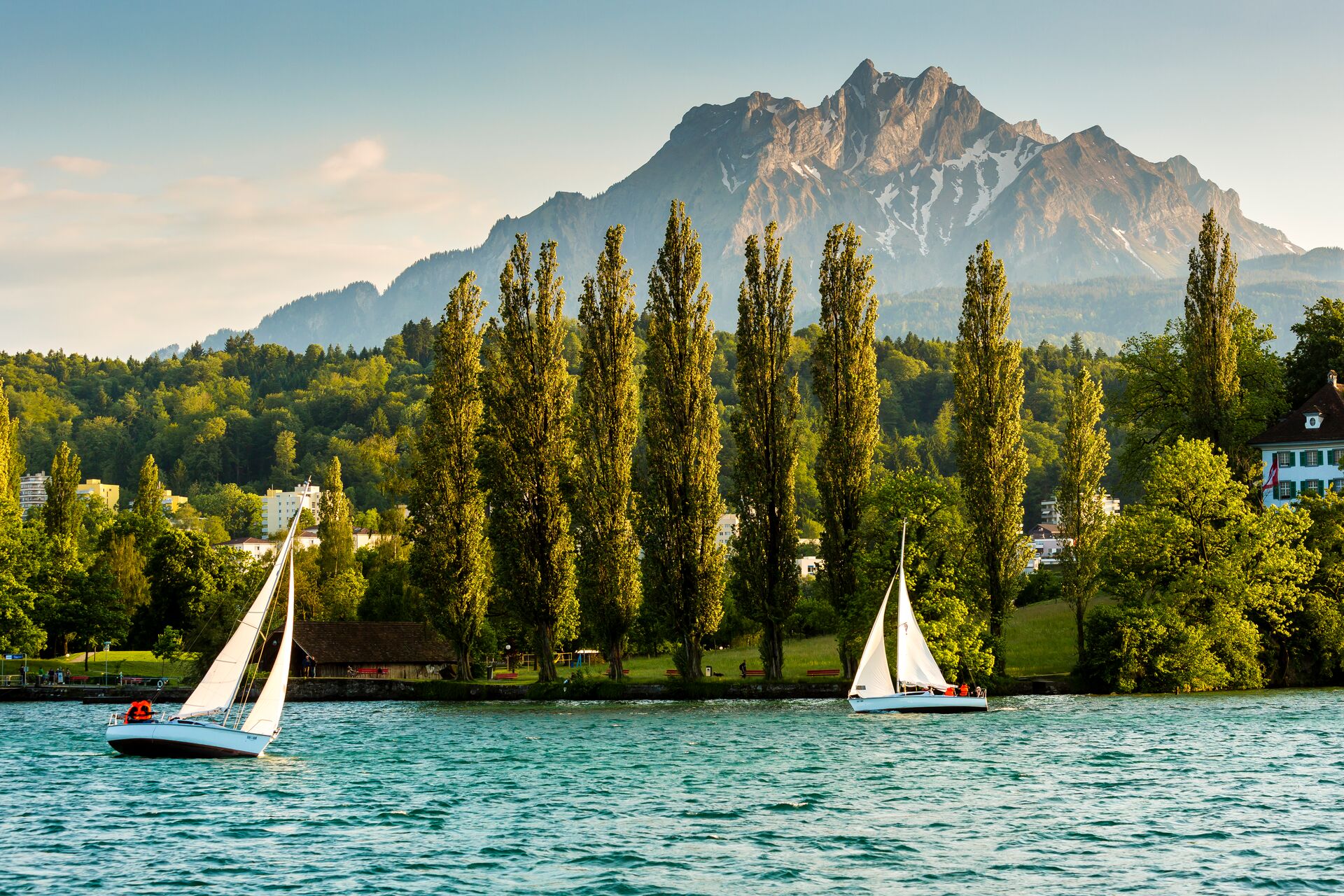 Yachts On Lake Lucerne in Switzerland with Mount Pilatus in the background