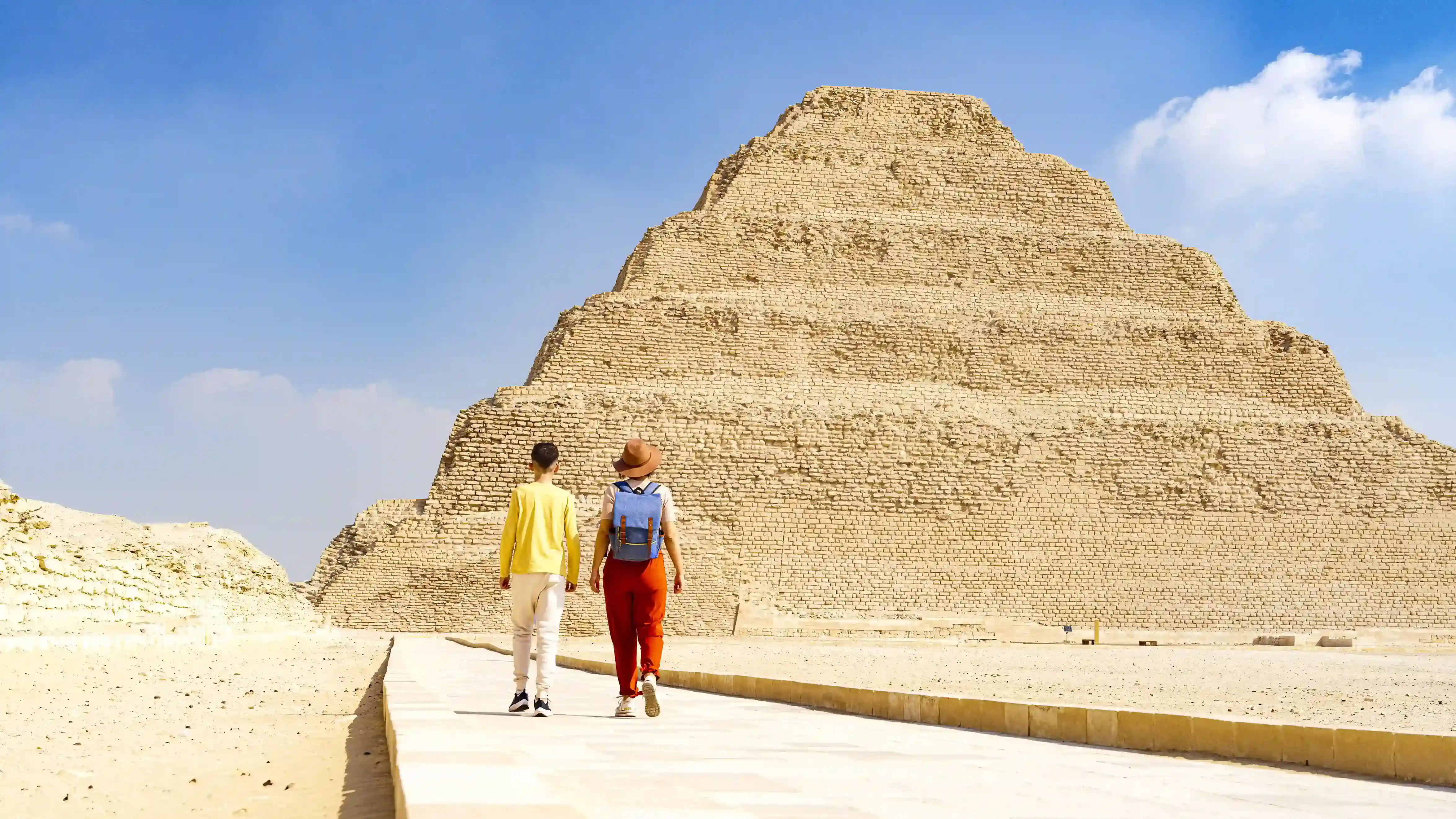 Mother And Son Looking At Pyramid In Egypt