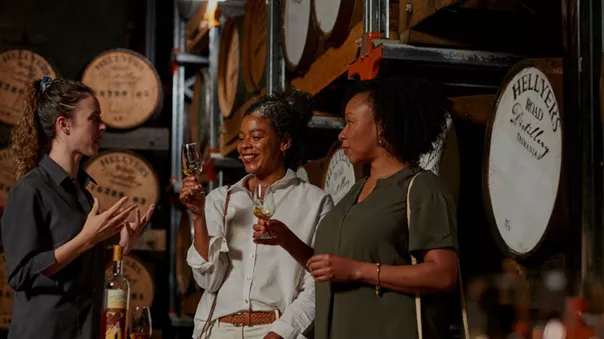 A group of people in a whisky distillery