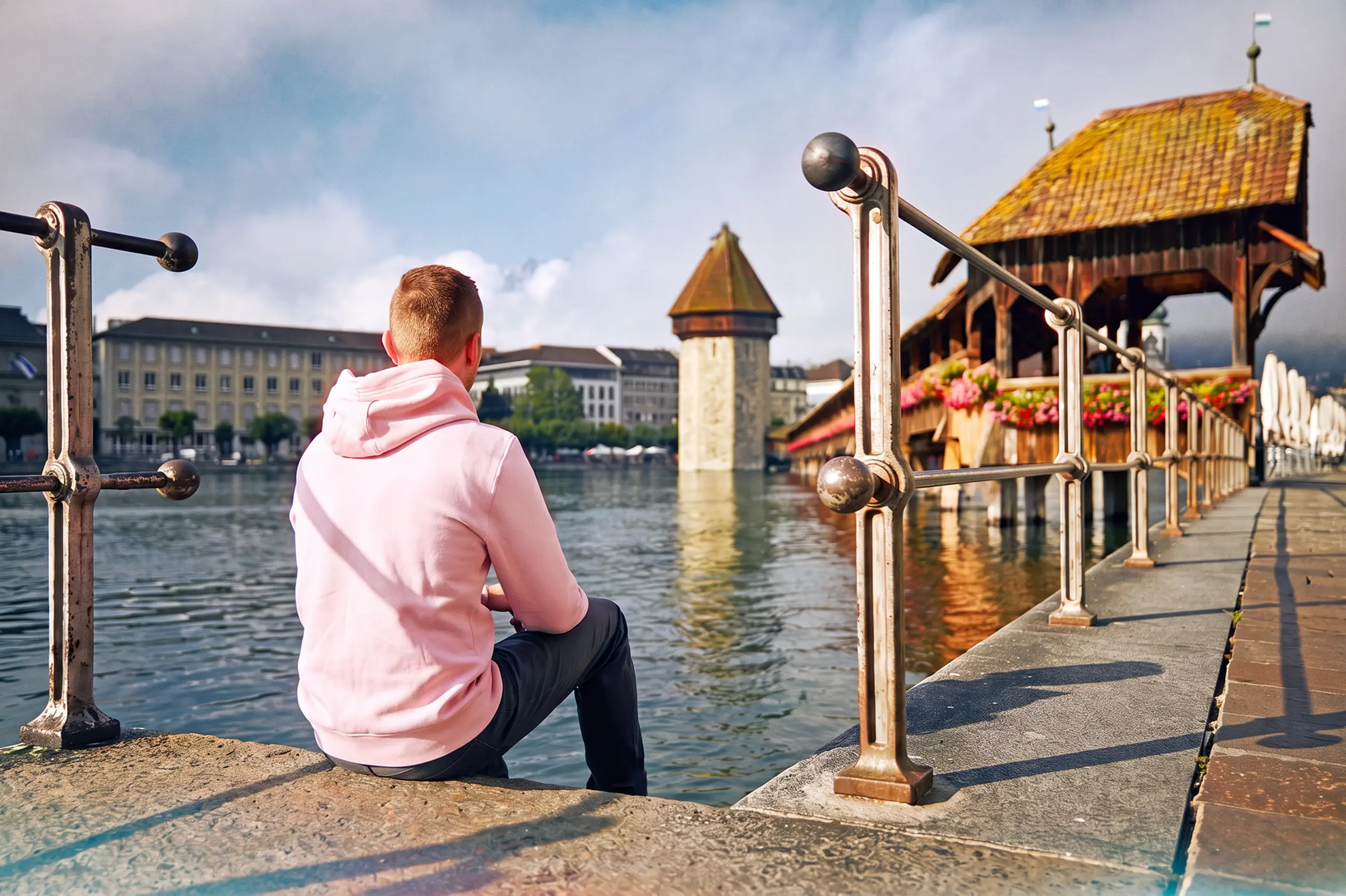 day-hero-traveler-in-old-town-chapel-bridge-lucerne-switzerland-1266909773.webp