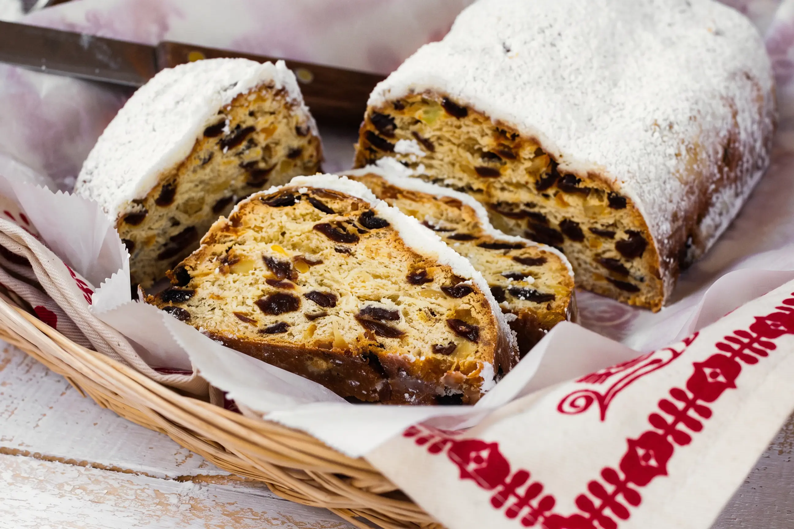 day-hero-christmas-stollen-cut-into-slices-dresden-germany.webp